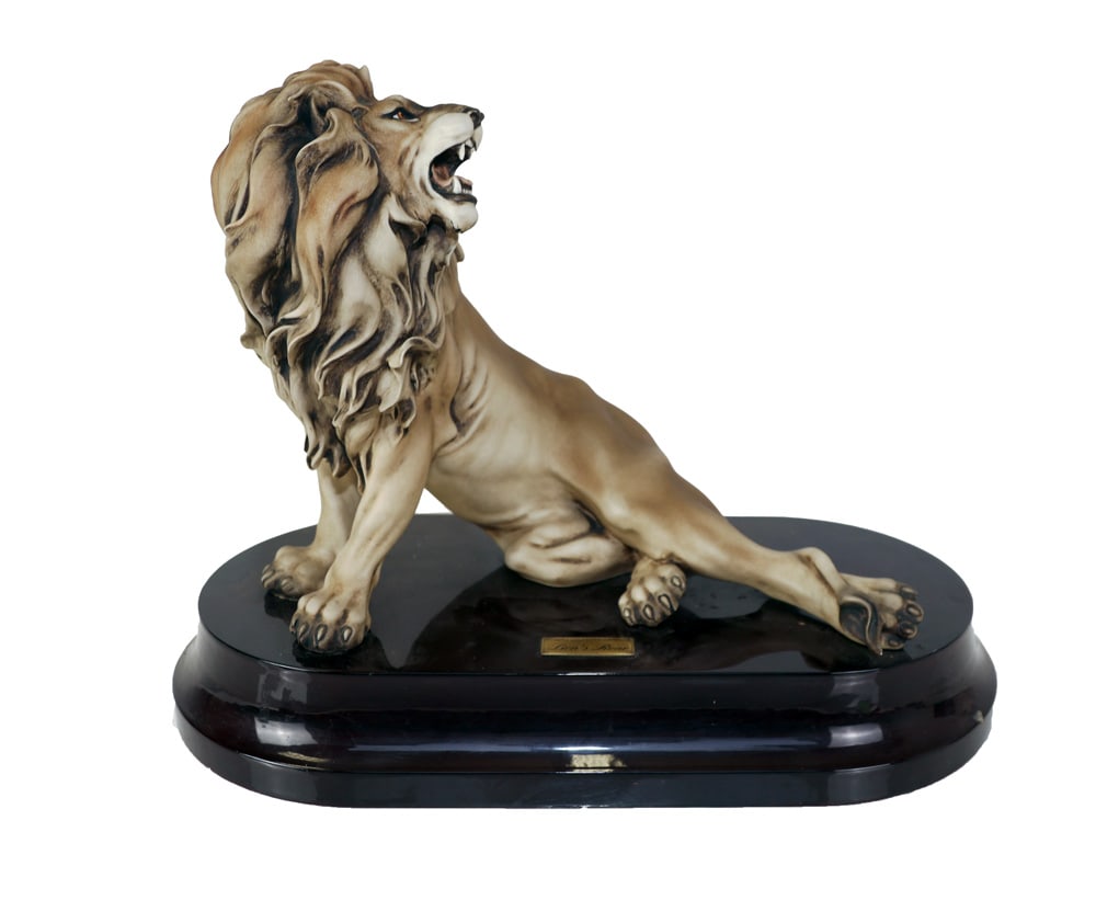 Giuseppe Armani Lion Sculpture: Giuseppe Armani "Lion's Roar" limited edition lion sculpture, Model 18425, bearing plaque to plinth. [Overall: 15" H x 19" W x 10" D]. Scattered marks and wear.