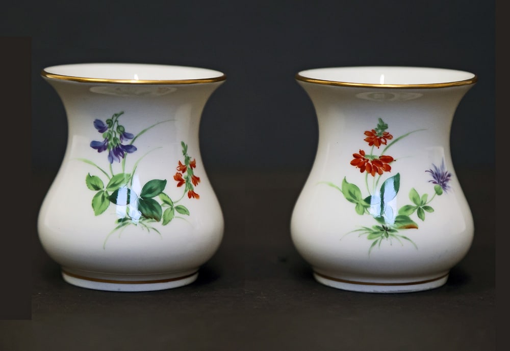 Small Pair of Meissen German Porcelain Vases: Small pair of Meissen German porcelain vases. [2 5/8" H x 2 3/8" Diam.]. In overall good condition.