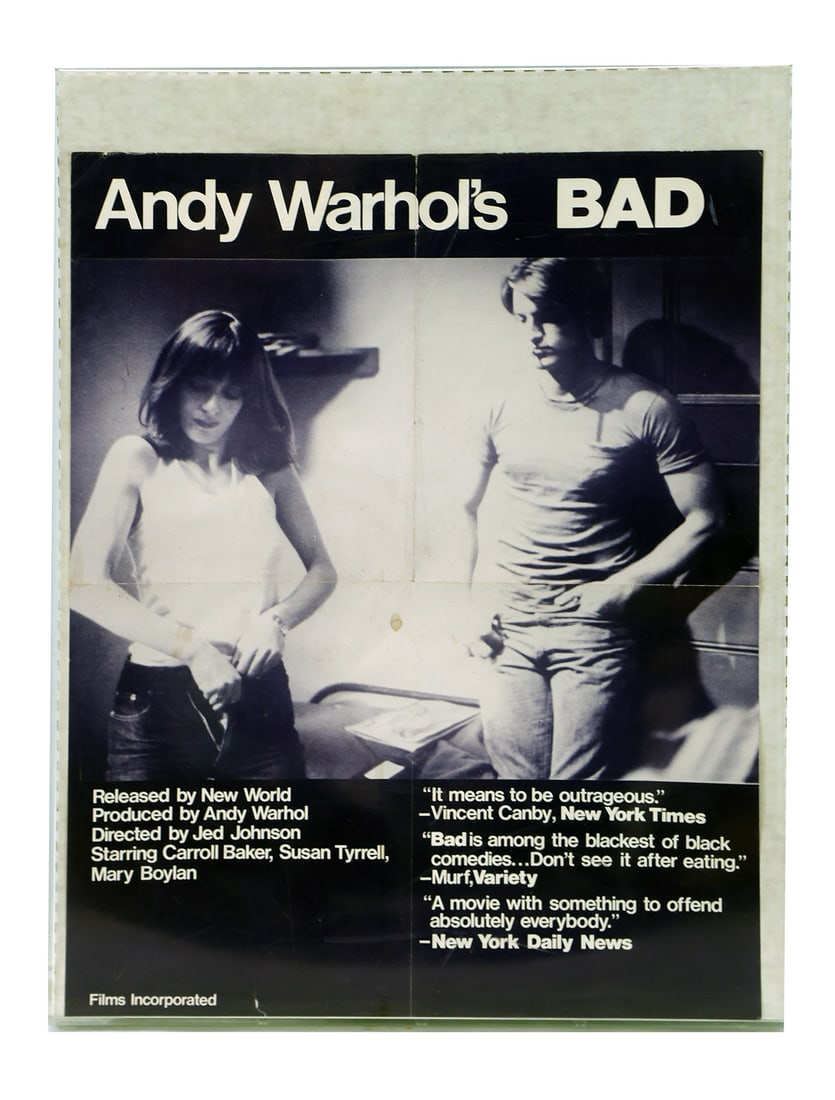 Andy Warhol "Bad" Movie Poster: Andy Warhol "Bad" movie poster. [Image: 22" H x 17" W mounted in larger frame]. Fold wear and stains, otherwise in fair condition.