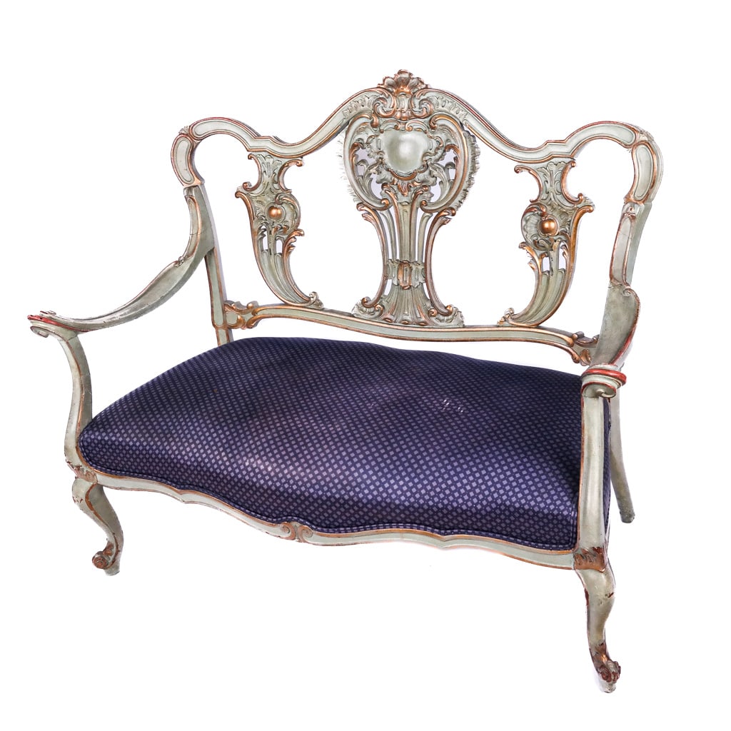 Venetian-Style Painted Carved Settee: Antique green-painted ornately carved settee. Match with Lot 567. [40 1/2" H x 48" W x 21 1/2" D' 16" H to seat]. Needs restoration to right arm.