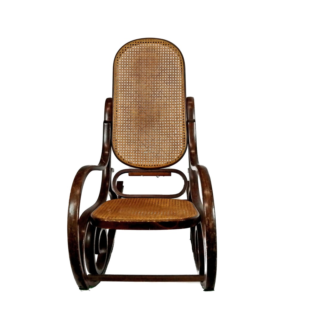 Vintage Caned Bentwood Rocking Chair: Vintage caned bentwood rocking chair, mid-20th century, in the manner of Michael Thonet (German/Austrian, 1796-1871) with elegant curved line, unmarked. [40" H x 39" W x 20" D]. Losses to caning; wear