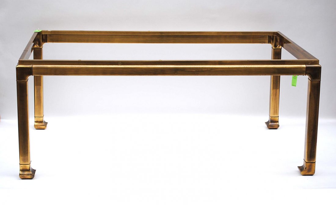 Modern Brass & Glass Dining Room Table: Asian inspired dining room table with glass top. 70" W x 42" D x 28 1/2" H. Some pitting and oxidation, otherwise in good condition.