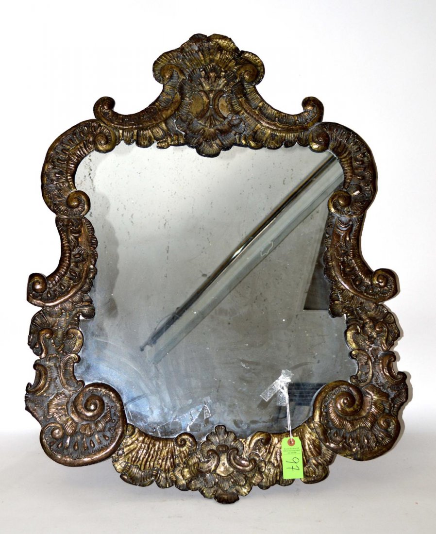Repousse Brass Mirror: Cartouche form repousse brass clad mirror.