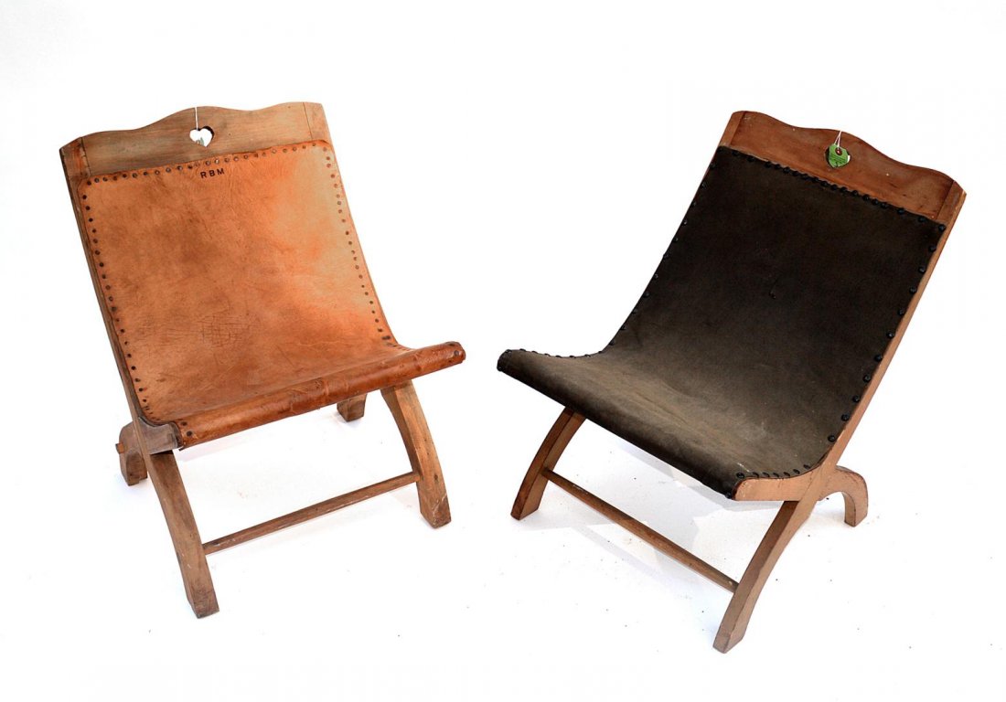 Two William Spratling Chairs: Each upholstered, one signed by William Spratling. One chair with worn upholstery, one missing stretcher. 18 1/2"L x 16 1/2"W x 33"H