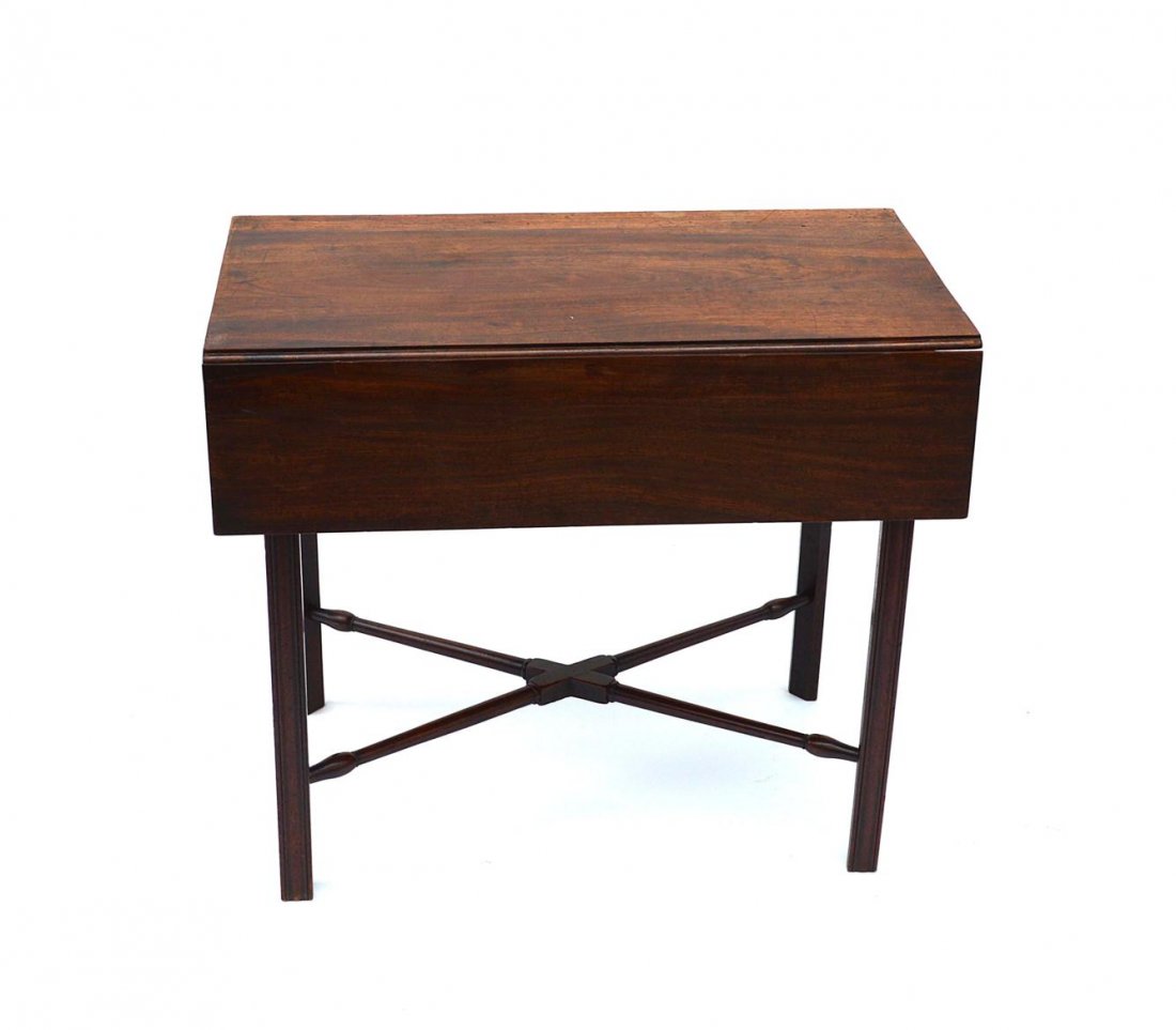 Antique Mahogany Drop-Leaf Side Table: Bears one drawer, straight legs, and turned cross-stretchers. 18" W [closed] x 31" D x 26 1/2" H. 31 1/2" W [open]. Top bears minor defects consistent with age and use.