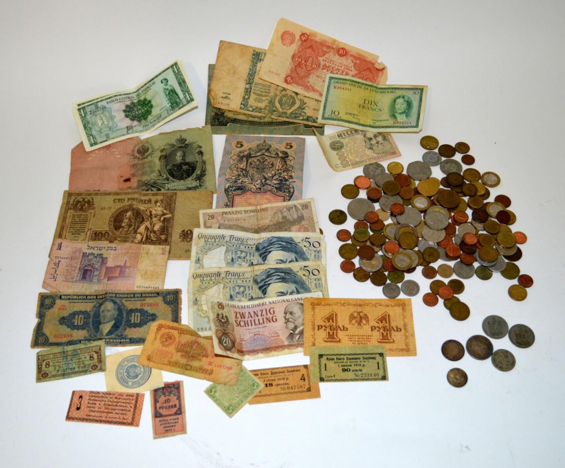 International Currency - Paper & Coin: Includes paper money [15 items] comprising: Brazil, Czarist Russia, Israel, Italy, France, Luxembourg, and early Soviet Russia and others. Coins [150+] comprise a similar global variety. [Approx. 165 