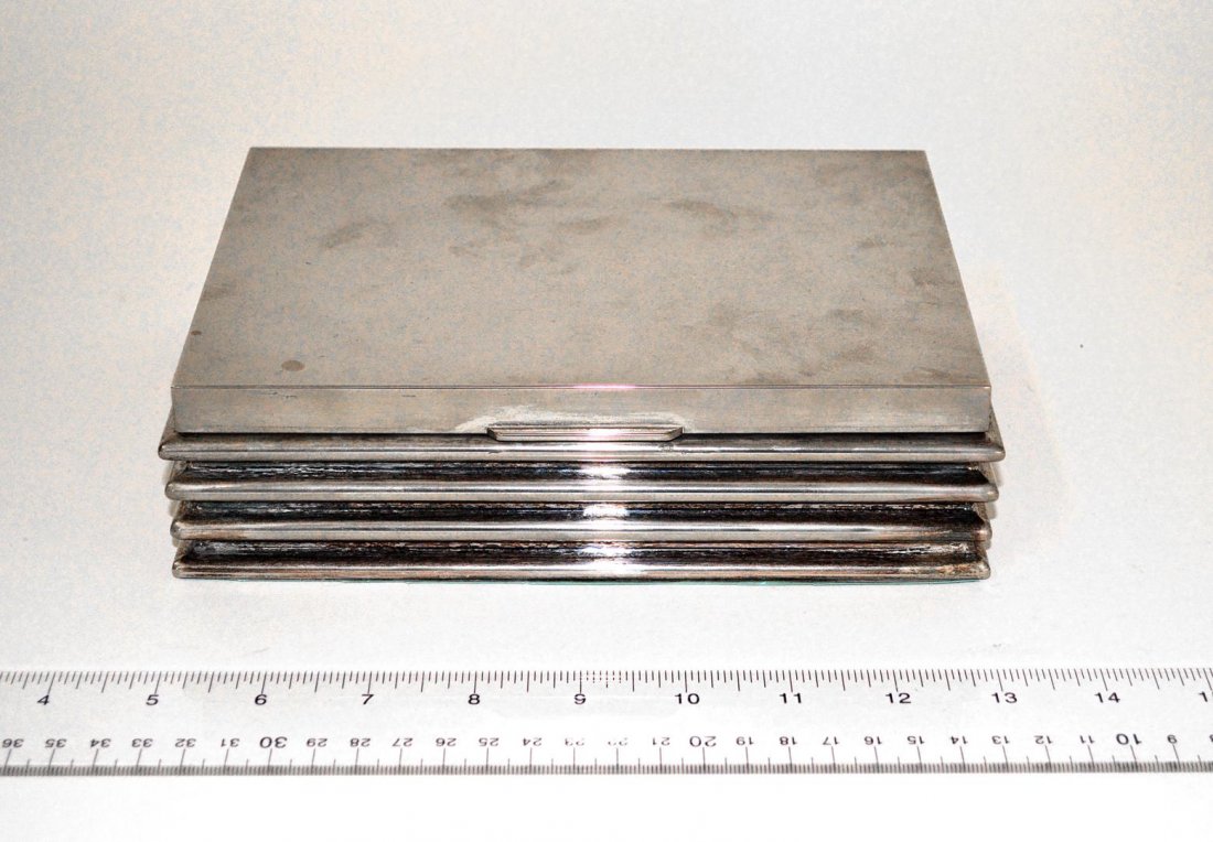 Art Deco Silver-Plated Humidor: Features four raised horizontal bands. Some minor scuffs and wear to finish, otherwise good. 8 3/8" x 6 1/8" x 2 1/4" H.