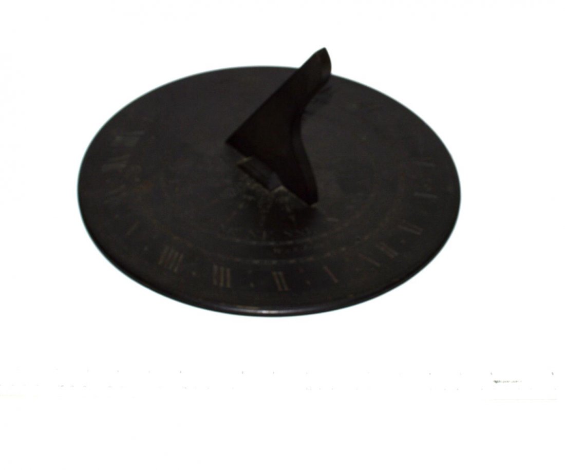 Bronze Sundial: English sundial, incised by W. & S. Jones, London. Good condition. 14 1/2" Dia x 8 1/4" D.