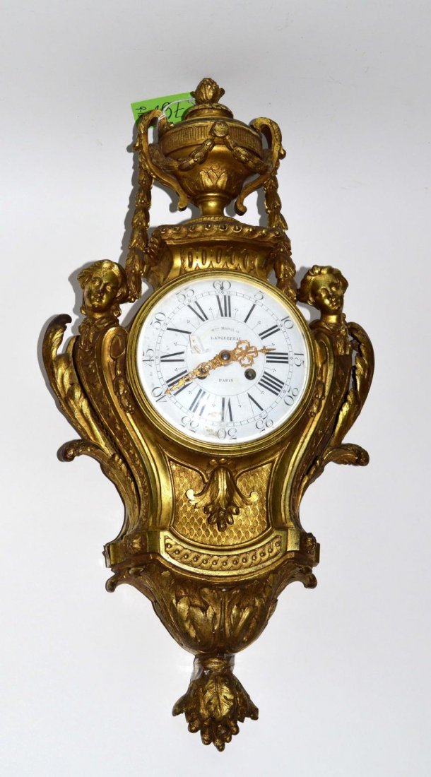 Gilt Bronze Cartel Clock: French bronze dore cartel clock with urn and figural decor, the face inscribed "LANGUEREAU, Paris" 19th C. 26" H x 14" L [approx]