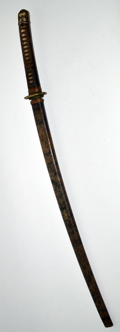 Vintage Japanese Katana with Shagreen Saya: Bears shagreen scabbard, braided handle, and bronze fittings. Appears complete, needs restoration. Blade 27 1/2", overall: 38 1/4" L.