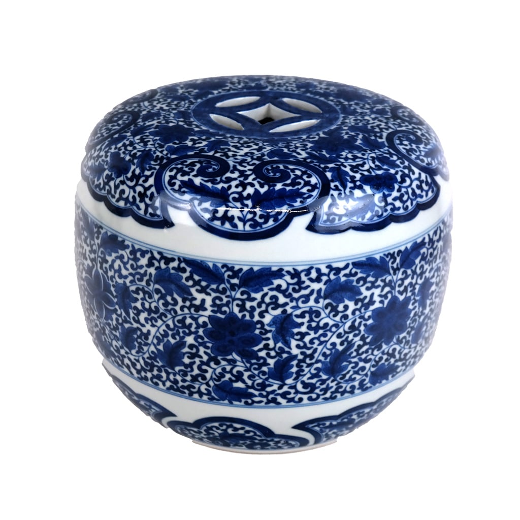 Chinese Porcelain Mini Garden Barrel: Chinese porcelain mini garden barrel / seat, with pierced top and open bottom, having allover blue and white glazed design. [8" H x 9 1/2" Diam.].