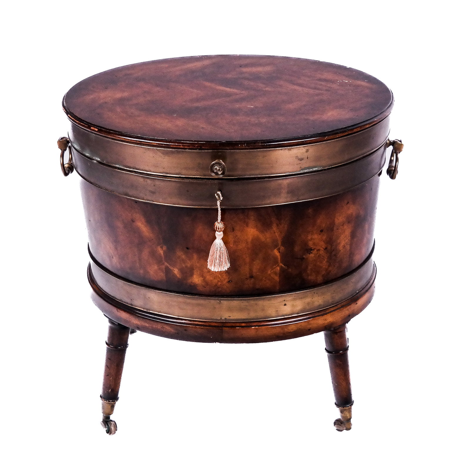 Oval Mahogany & Brass-Banded Cellarette: Late 20th century oval mahogany brass-banded cellarette, having a hinged lid, having fluted legs on casters. [23 1/2" H x 22 1/2" W x 19 1/2" D]. No liner; worn; losses.