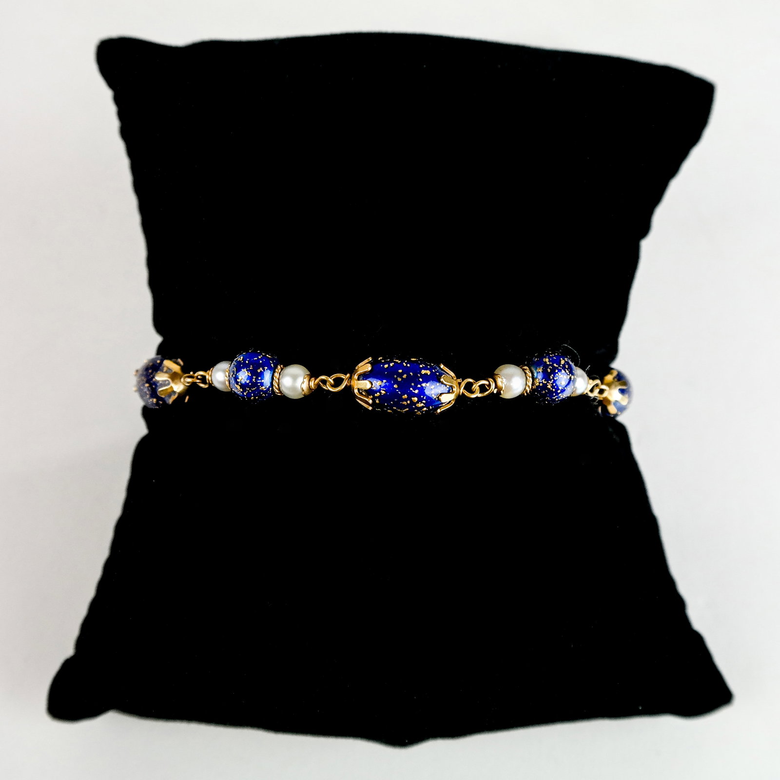 18K Gold, Enamel and Pearl Bracelet: 18K yellow gold, enamel bead and pearl bracelet. 8.3 dwt.