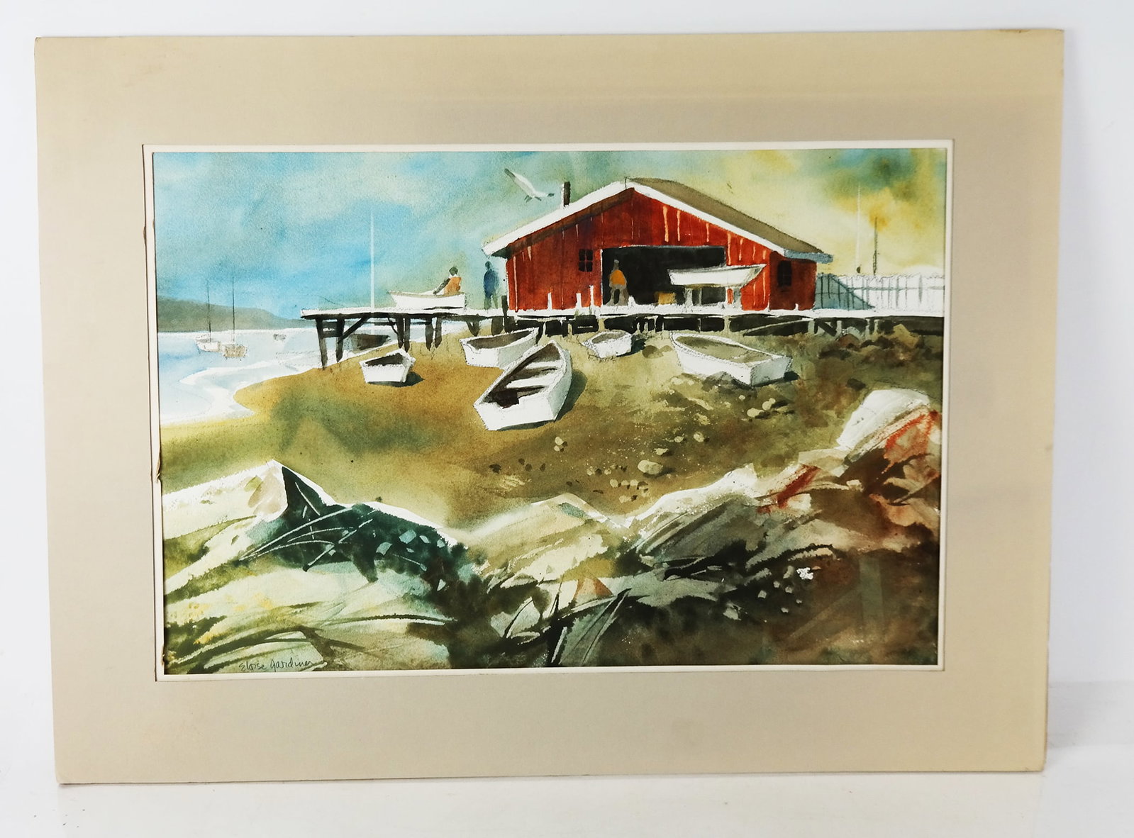 Eloise G. GILES: Harbor Scene - Watercolor Paintin: Eloise Gardiner Giles (American, 1921-2019) unframed watercolor on paper of a harbor scene with boathouse and boats, in the Impressionist style, signed lower left. [Mat: 20" H x 27" W]. Minor wear; lo