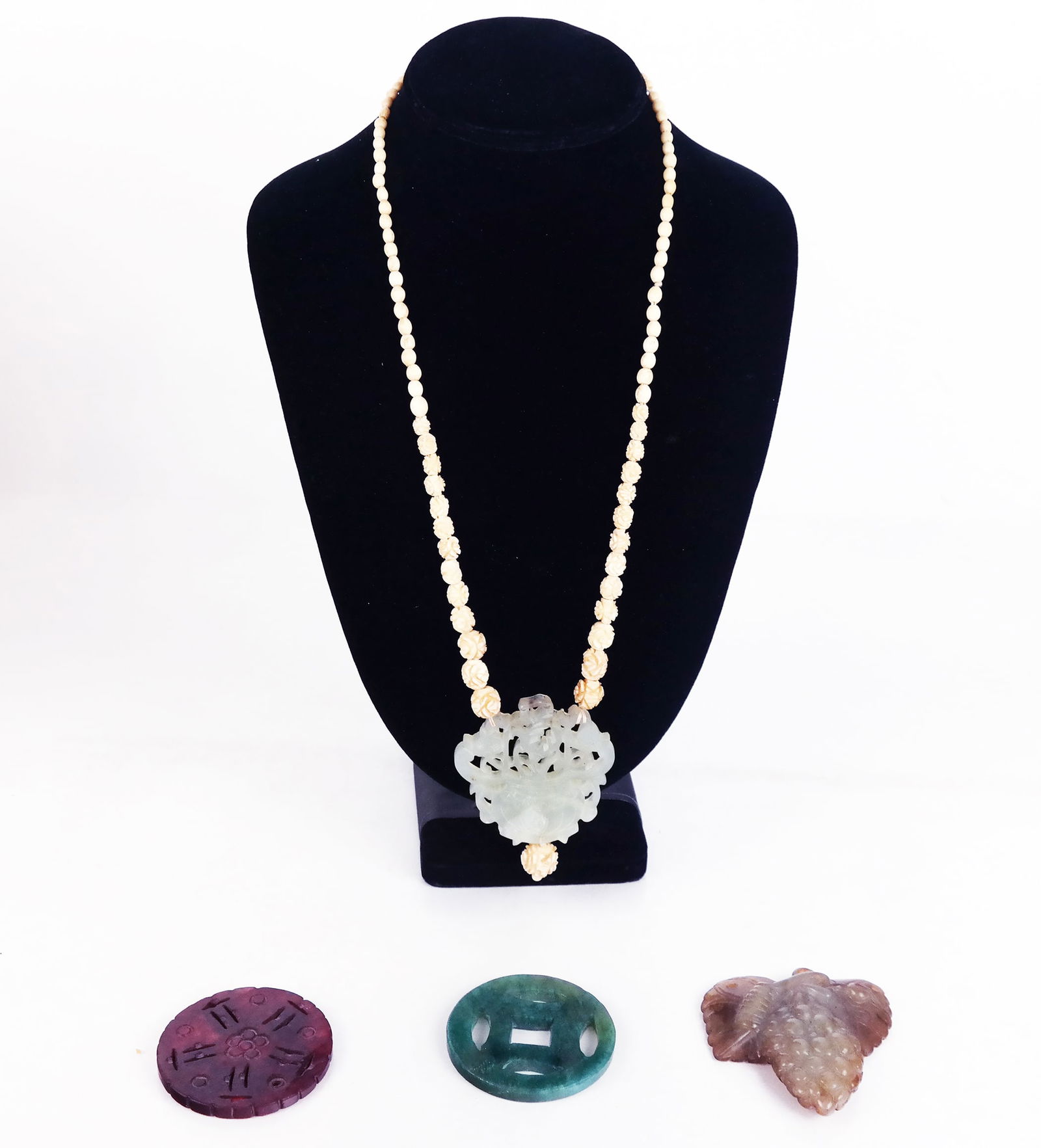 Four Asian Hardstone Pendants (1 of 10)