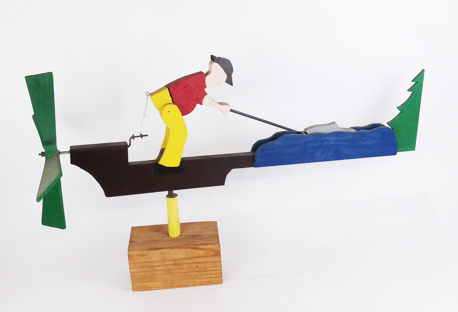 Modern Folk Art Wooden Whirlygig/Weathervane: Modern folk art wooden whirlygig or weathervane, with painted decoration, modeled as an angler fisherman which articulates the fishing pole up and down as the pinwheel blows and spins from behind, on 