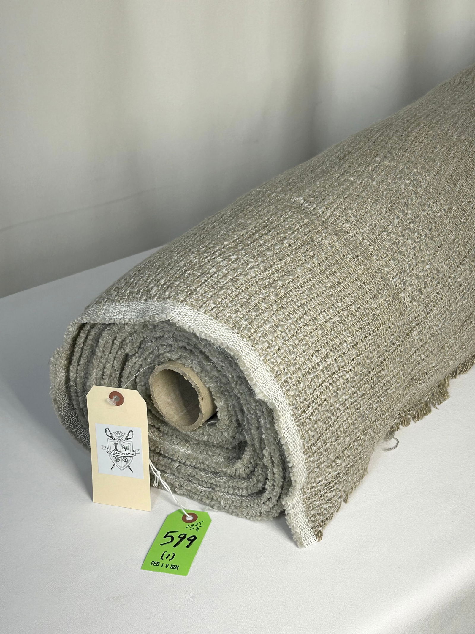 Classic Larsen Wide Width Casement Fabric: 12 yards of 116" width Larsen chief weight linen casement fabric in tan and greige. Cozy and masculine like a heavy Irish sweater.