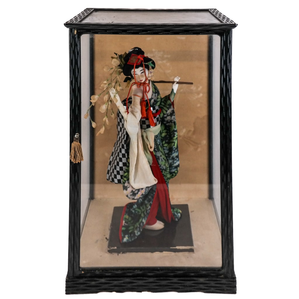 Japanese Doll in Shadowbox: Japanese doll in a shadowbox. [Case: 21 1/2" H x 13" W x 12" D].