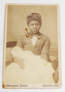 Antique Albumen Print Photograph: Mid- to late 19th century albumen print cabinet card portrait of African-American nanny with child, with printed credit: Palatka, Fla., inscribed to mount in pencil verso; a nice example of antique/vi