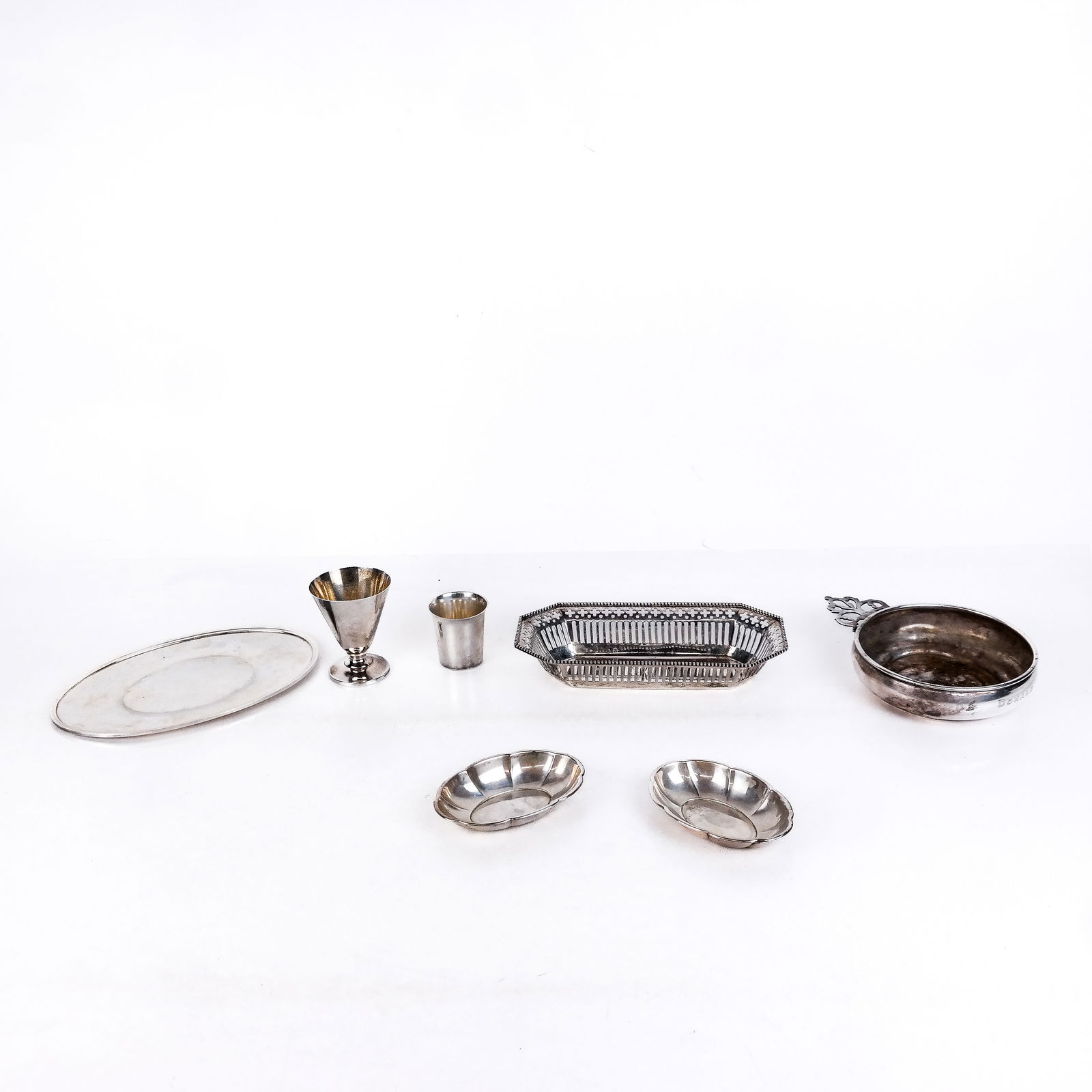 7 Sterling Silver Table Articles: Seven (7) sterling silver table articles, including a wine taster, tray and others. [Tray: 8" x 5"]. 17 ozt.