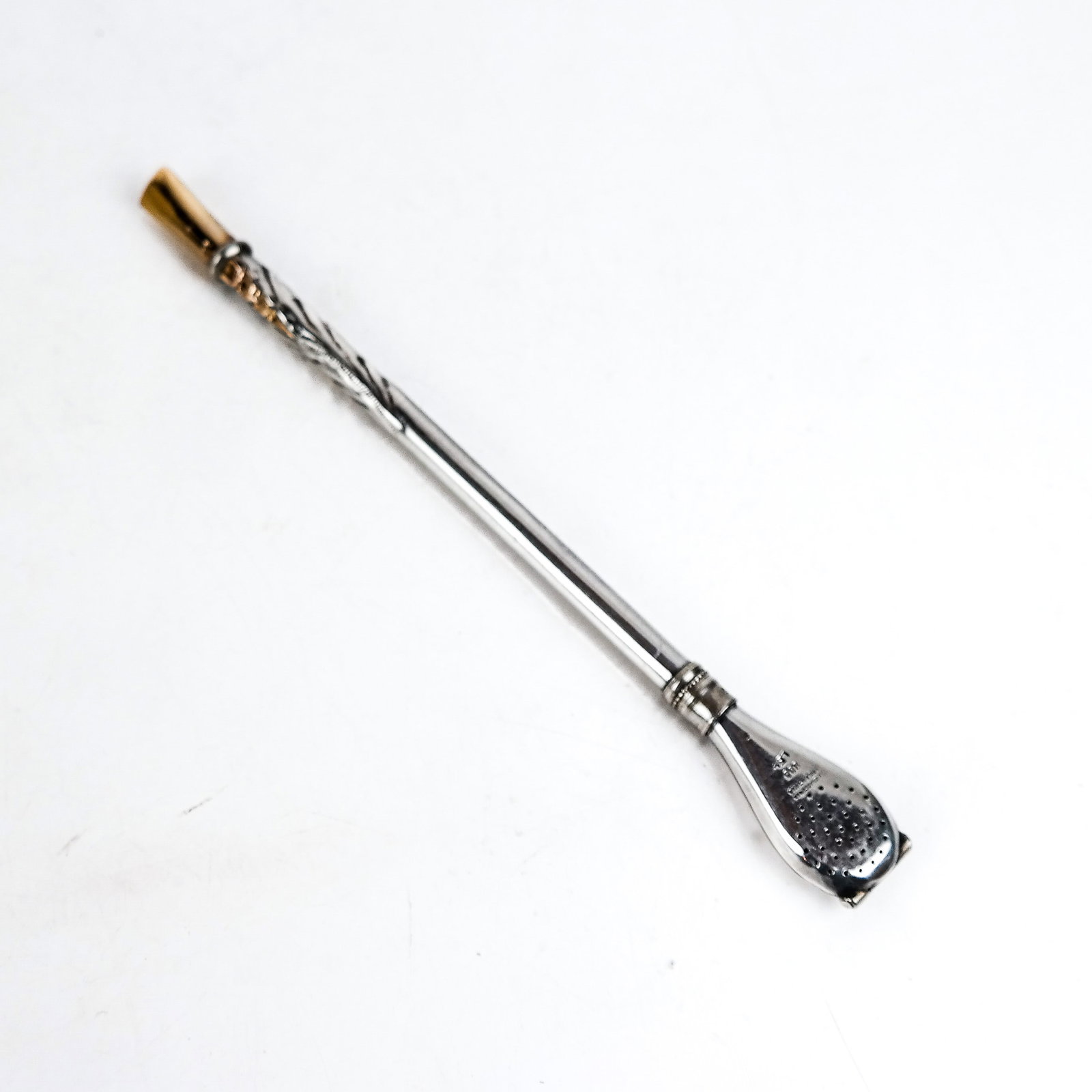 Argentinian Silver & 18K Gold Tea Taster: Industria Argentina .800 marked silver tea taster with an 18K yellow gold mouthpiece. 31 grams total inclusive weight. [8" L (7" silver and 1" gold].