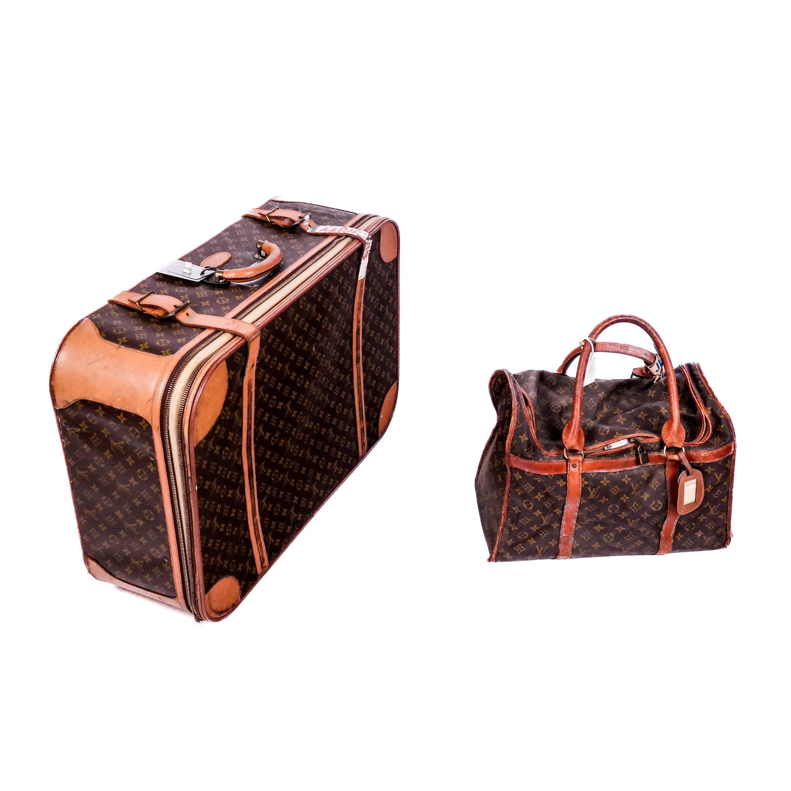 Louis Vuitton Suitcase & Tote Bag: Louis Vuitton suitcase, and tote bag. Largest [9 1/2" H x 21 1/2" W x 28 1/2" D]. Both in very worn condition.