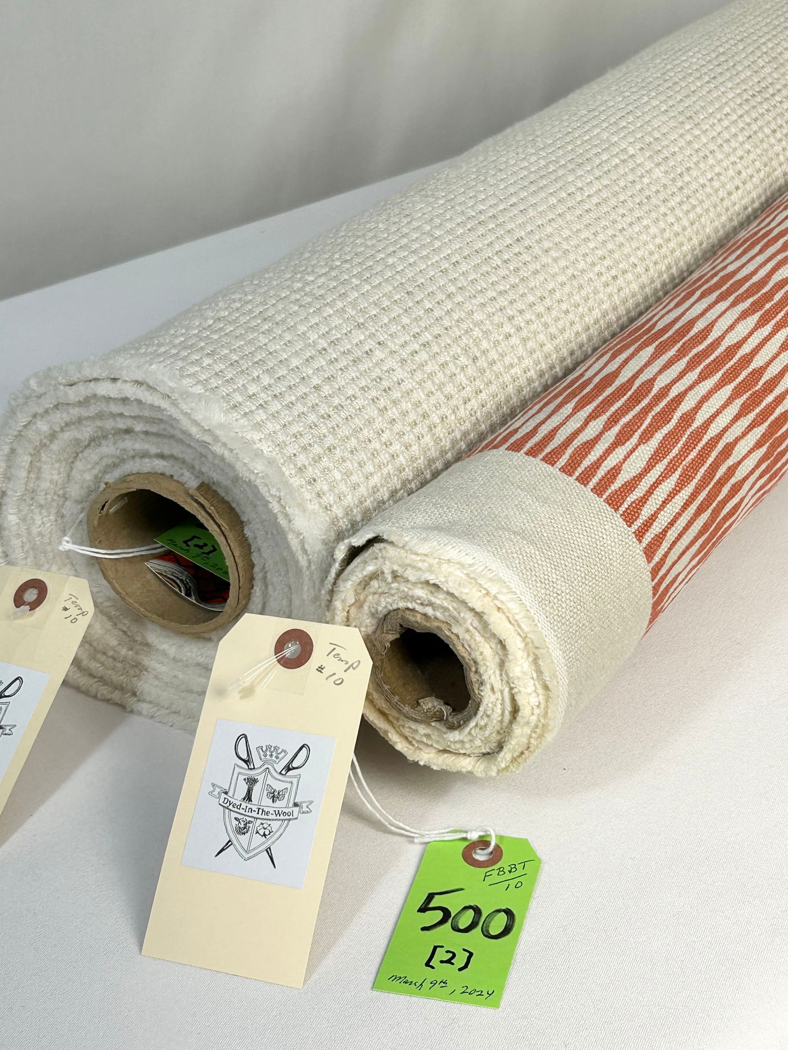 Raoul Textiles Print and Colefax & Fowler Textured Fabrics: 1) 5 yards of Raoul Textiles' one-screen printed all-purpose linen called "Zoe" in "Cayenne", a coral on driftwood coloration, 51" width. There are two (2) lengths on one tube: 3 yards inside and 2 ya