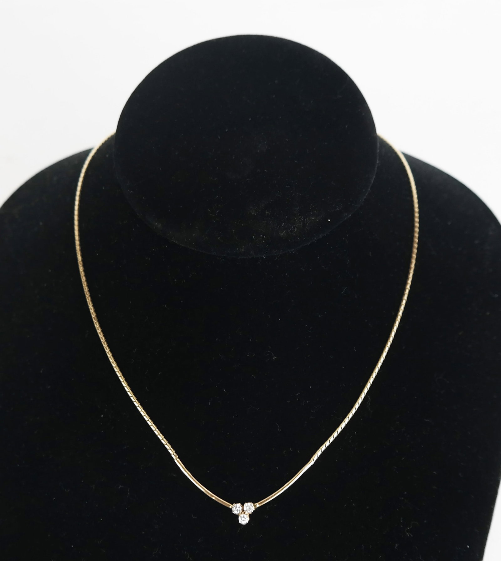 14K Gold & Diamond Choker & Pendant: 14K yellow gold choker with a clover-form diamond pendant. 4.2 dwt. inclusive.