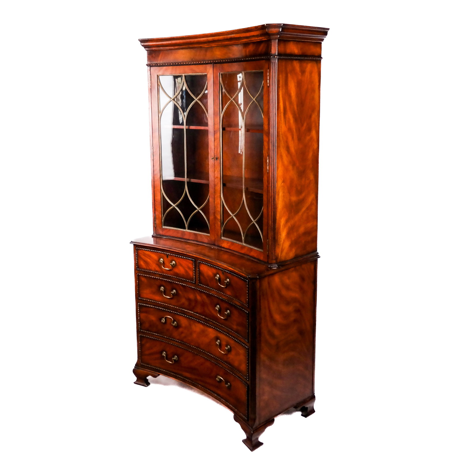 20th C. English-Style Concave Breakfront: 20th century two-section mahogany breakfront bookcase by "Modern History", the top with two concave glass doors above five concave drawers, with beadwork design molding trim around the drawers. [88" H