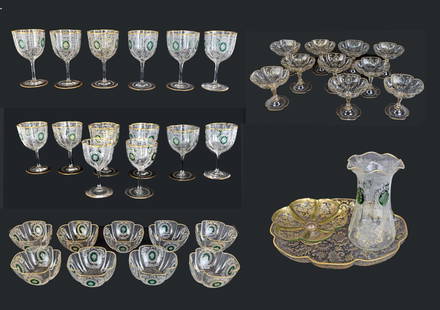 Continental Gilt & Etched Glass Stemware: 60 pieces of Continental gilt and etched glass stemware, late 19th century, possibly Josef Hoffman (Austrian, 1870-1956) for J & L Lobmeyr, in the Bohemian taste, with unusual quatrefoil outline and f