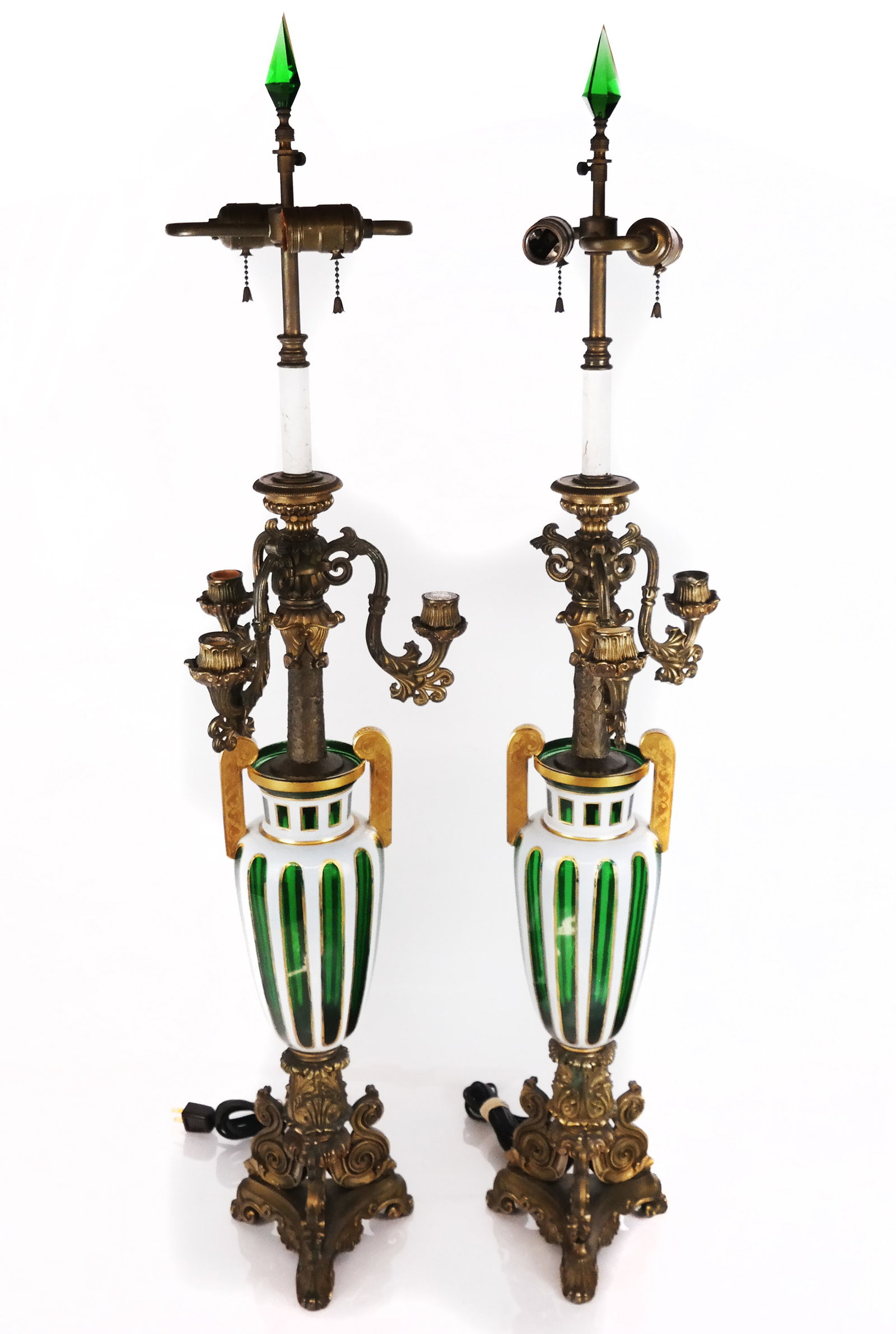 Pair of Hand-Painted Bristol Lamps: Pair of early 20th century English hand-painted Bristol lamps, possibly converted from vases, now as lamps, on painted wood plinths. [29" H to top].