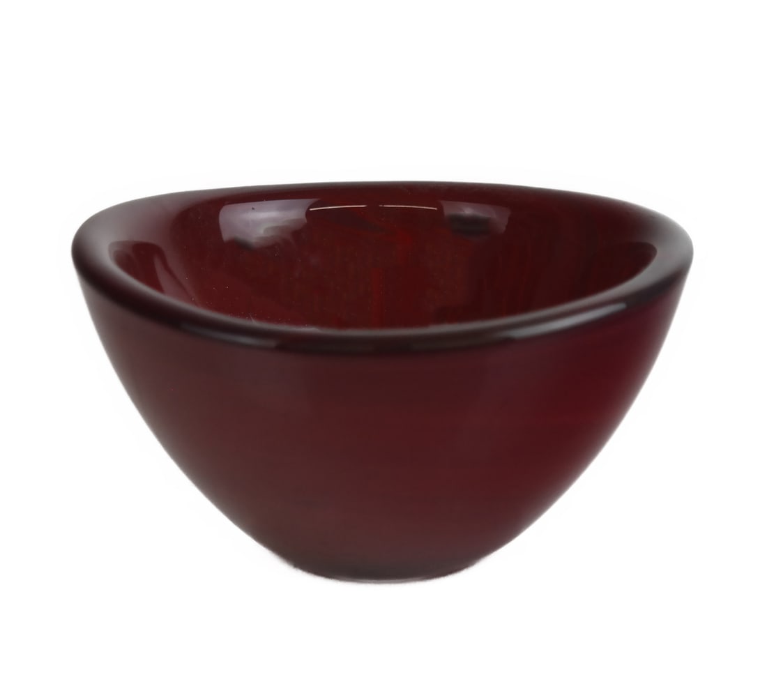 Orrefors Red Case Glass Bowl: Orrefors odd-shaped bowl of red and purple cased glass in clear design, signed illegibly and numbered. [3 1/2" H x approx. 6" Diam.].