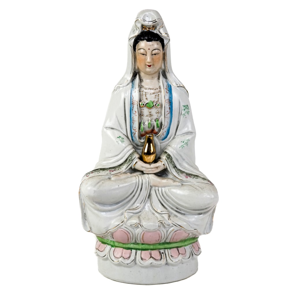 Chinese Porcelain Figure of Guanyin: Chinese porcelain figure of a Guanyin, late 20th century, modeled seated and holding an urn. [13 1/2" H x 7" W x 4 1/2" D].