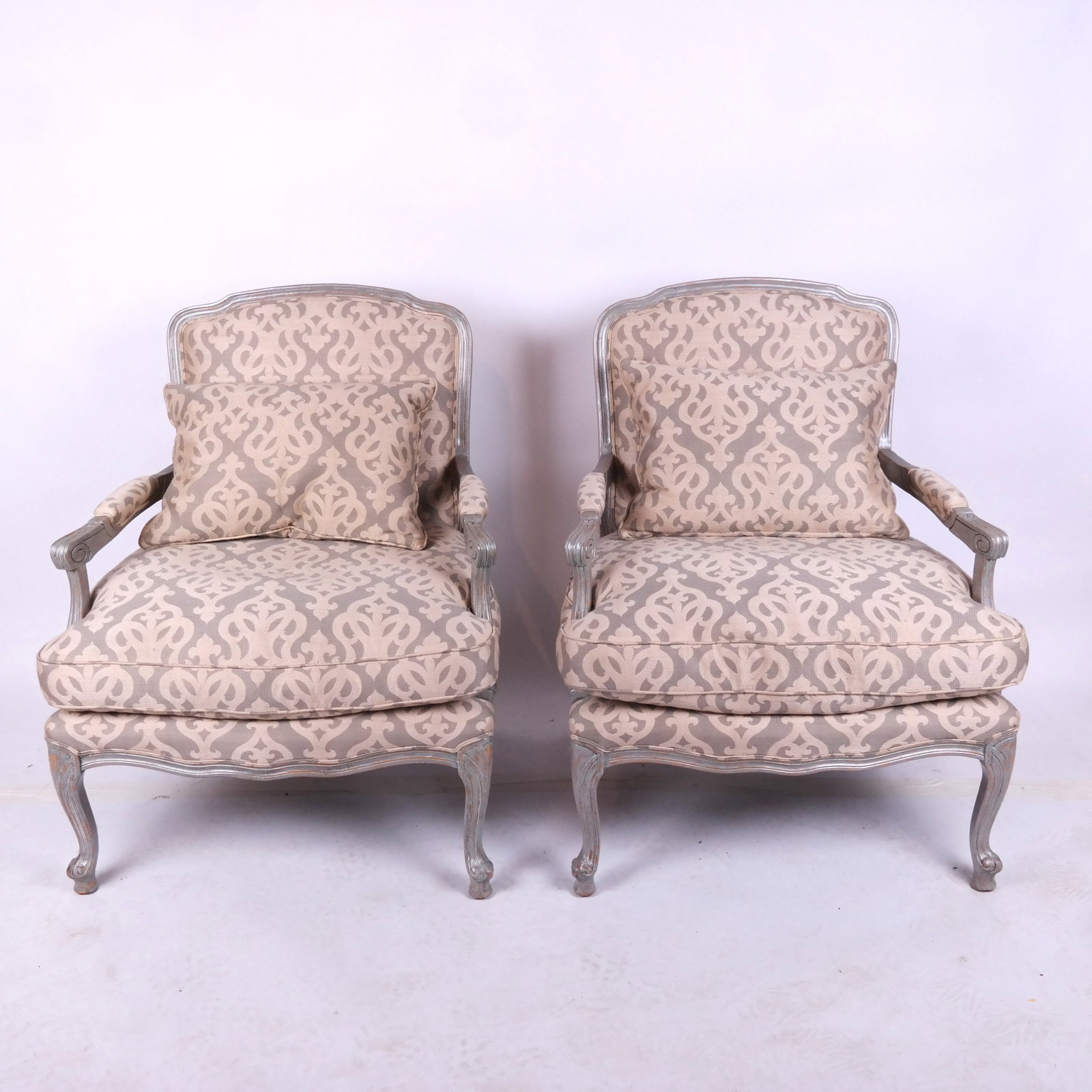 Pair of 20th C. Painted Armchairs: Pair of painted armchairs with green and gold upholstery. [38" H x 29 1/2" W x 29" D; 18" H to seat].