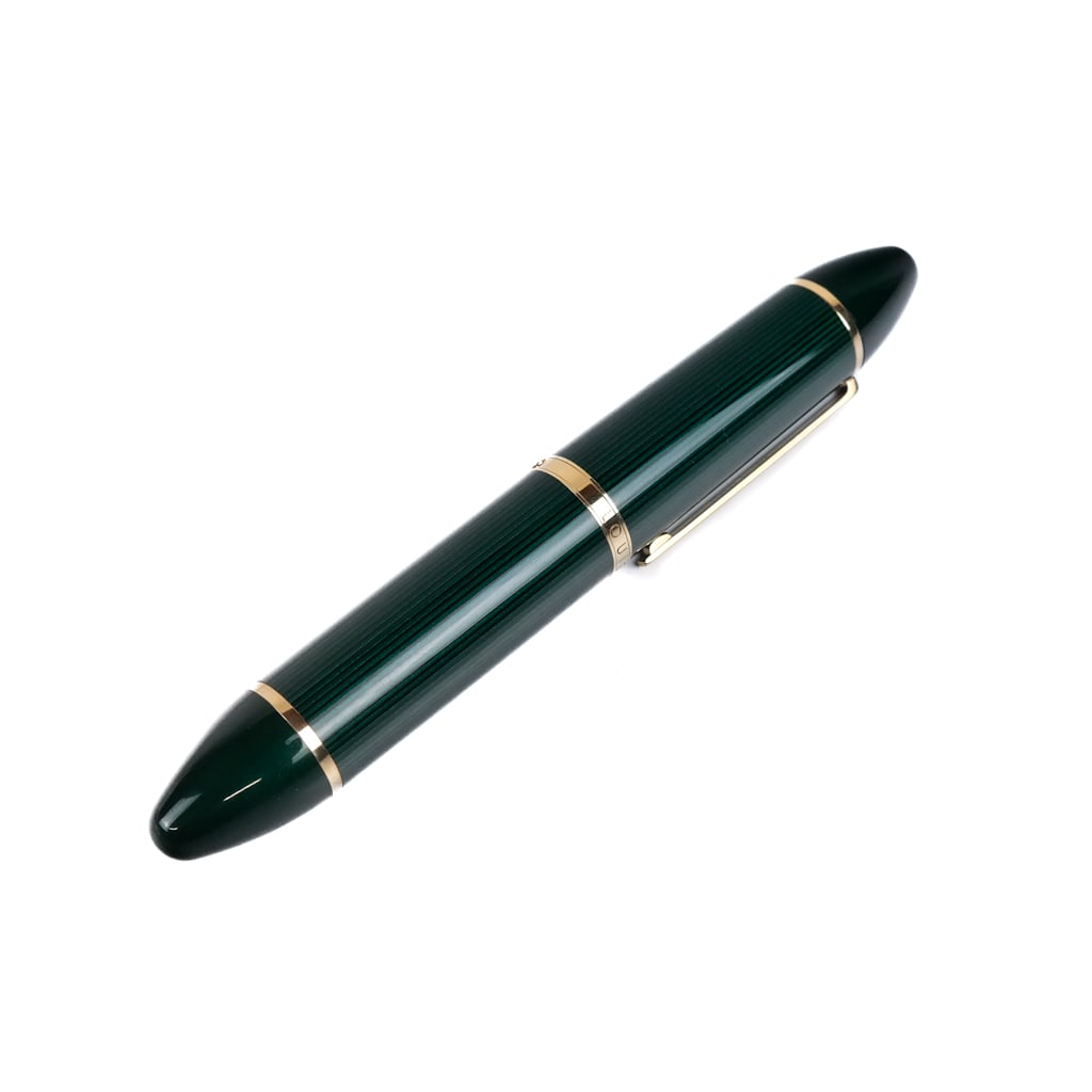 Louis Vuitton "Doc" Fountain Pen: Louis Vuitton 18K gold nib and green enamel fountain pen, a fine writing instrument, with embossed logo to nib and stamped "750" for 18K gold. Provenance: From the Collection of renowned architect and