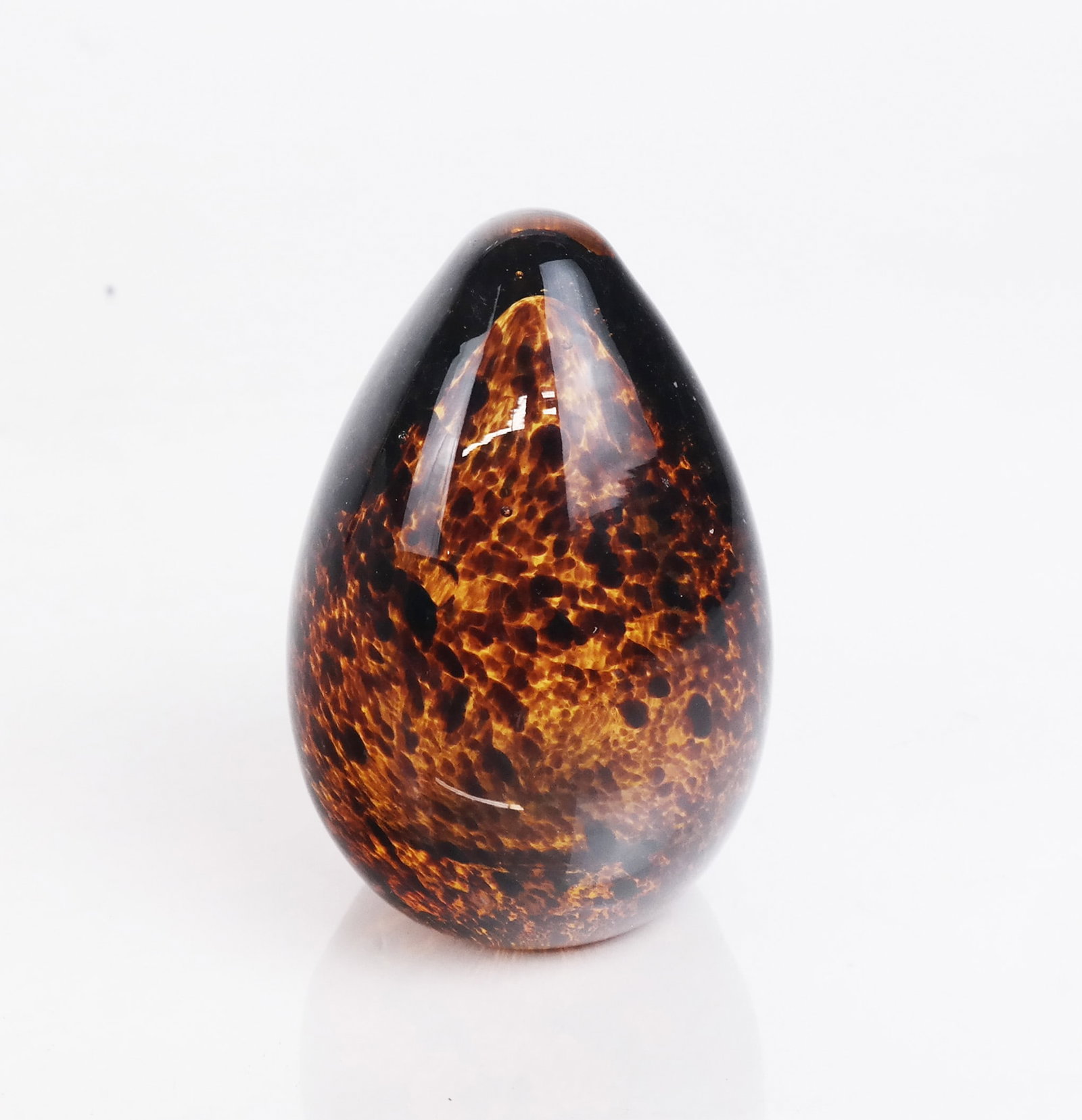 Murano Italian Glass Paperweight: Murano Italian glass paperweight, of egg form, in the Venetian manner with tortoise-style decoration, unsigned. [4 1/2" H x 3" Diam.]. Light scuffs and wear.