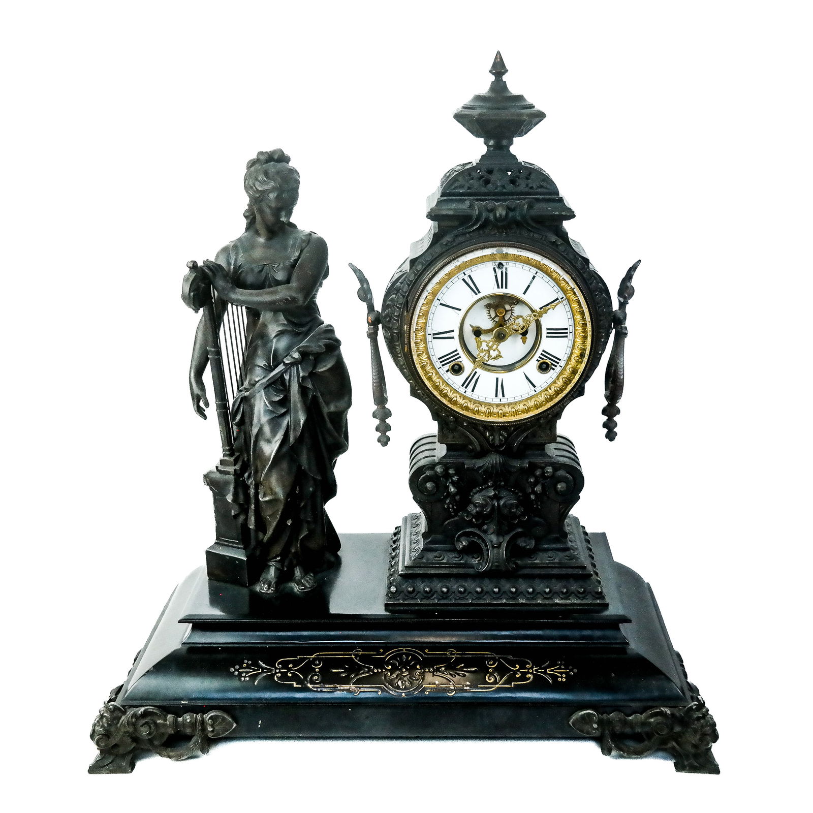 Victorian Bronze, Metal & Enamel Mantel Clock: Victorian bronze, metal and enamel mantel clock, depicting a muse with harp standing beside a clock with articulated lyre handles, enamel dial, and gilt metal hands and bezel, all resting on a plinth