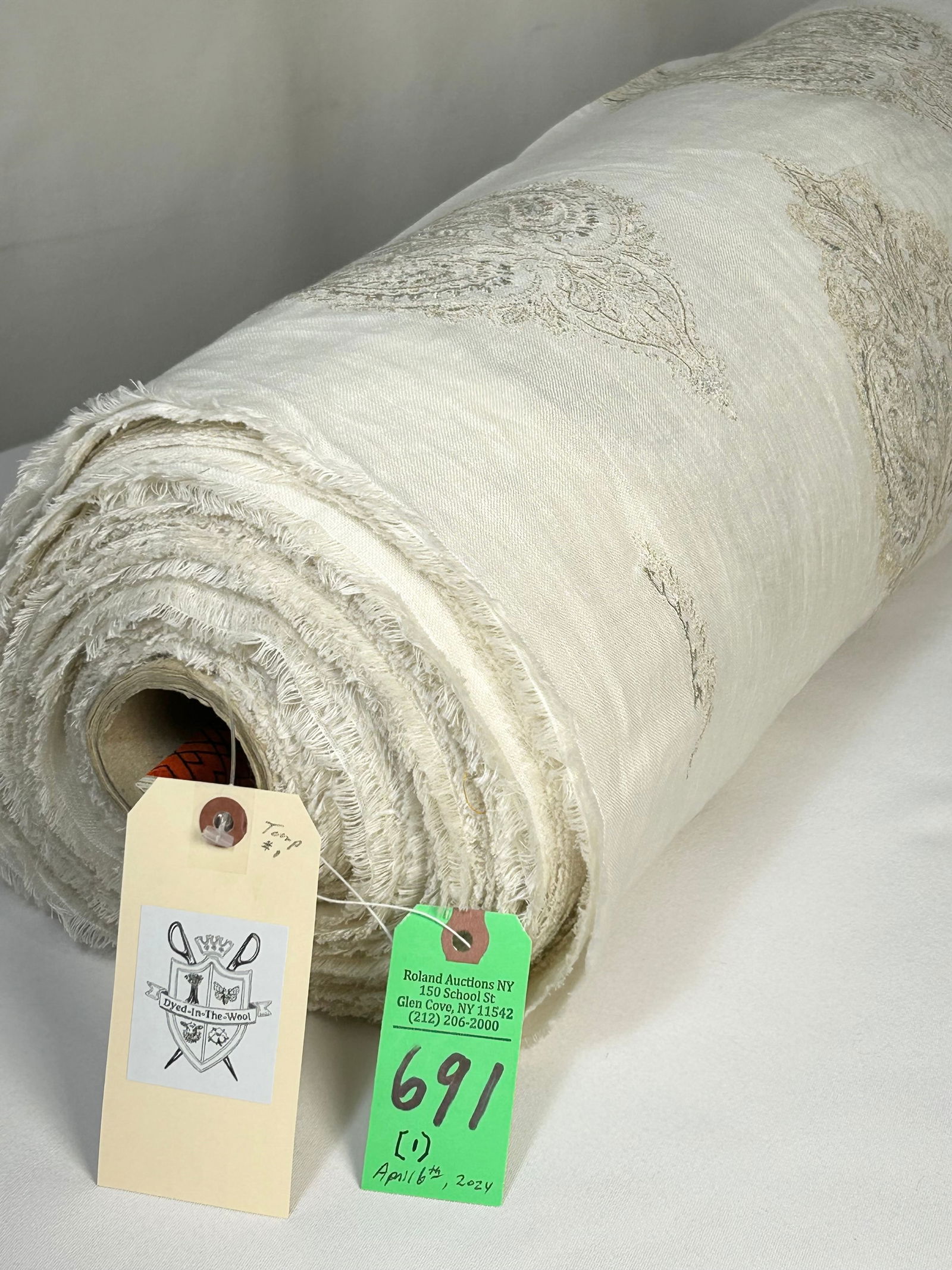 Colefax & Fowler's Embroidered Linen Fabric: 48 1/4 yards of Colefax & Fowler's "Eugene", a stunning embroidery on off-white linen, Item # F4313-01, color "Beige", approx. 49" width. There are 2 lengths on one tube: 36 1/4 yards on the inside an