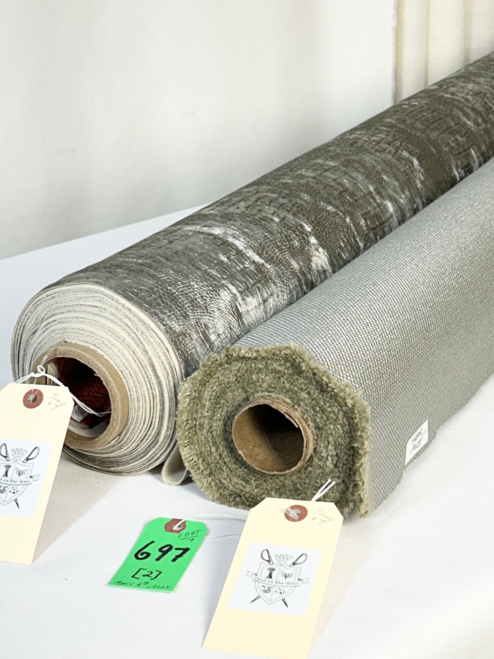 Modern European Texture and Grey Croc Fabrics: 1) 9 1/2 yards of Euro grid texture in steel grey colorway, a blend of polyester and viscose, 57" wide. High durability. Great for upholstery. In mint condition. 2) 11 yards of embossed faux crocodile