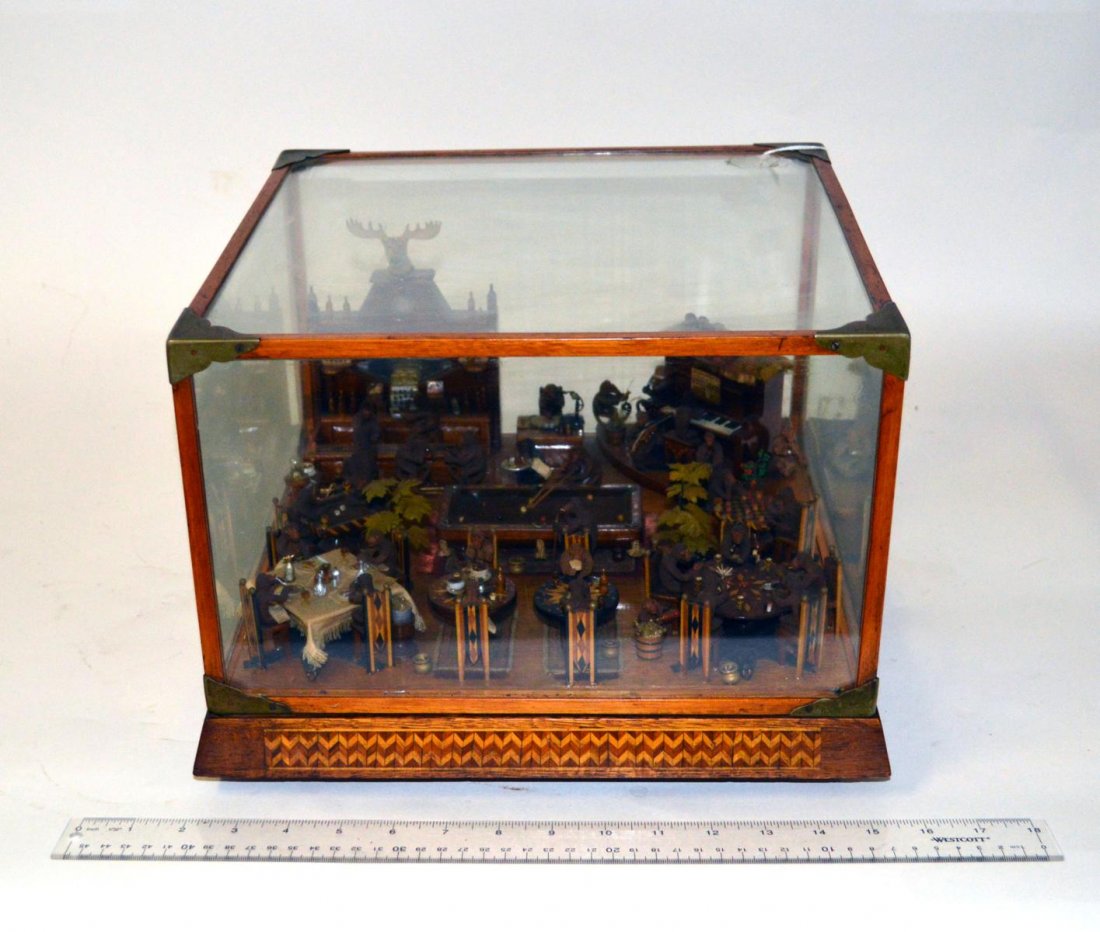 Outsider Folk Art "Monkey Bar": Accomplished by prisoners, the miniature vignette contains over 30 individually carved monkeys engaged in a broad range of activities. Bears intarsia accents throughout. Contained under glass in a han
