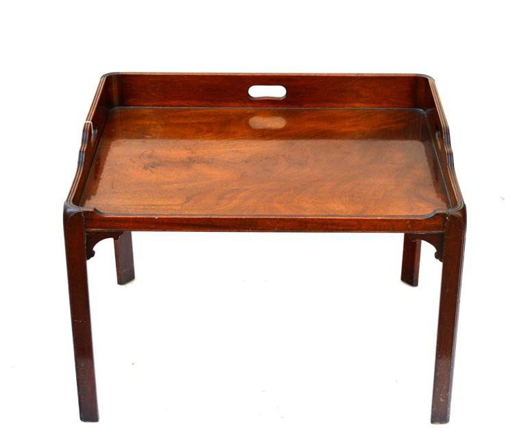 Butler's Tray Table: Georgian style mahogany butler's tray table, having open sides with shaped gallery. Overall good condition with wear. 29" x 22" x 21 1/2" H.