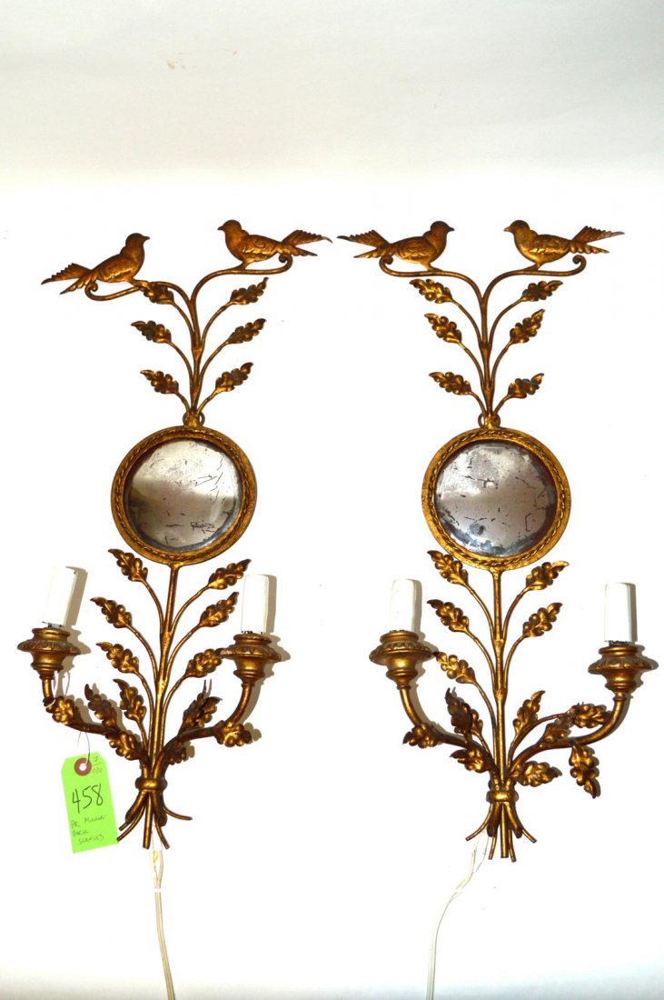 Pair of Mirror Back Sconces: Having two lights each and with bird surmount.