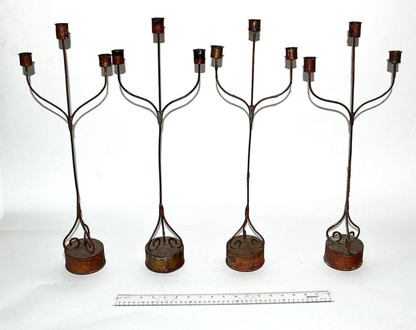 Four Tole Candlesticks: Set of four tole three light candlesticks. Poor condition.