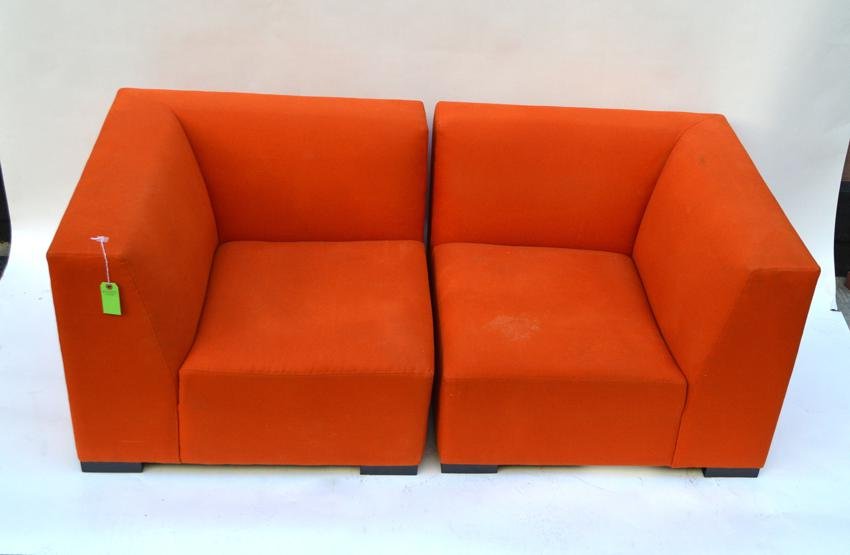 Modern Orange Settee: Two part orange upholstered settee. 70" L x 35 1/4" D x 27" H.