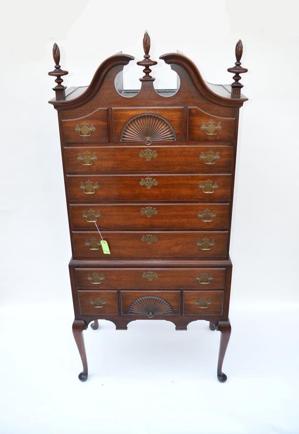 Kindel Queen Anne Style Highboy: Mahogany highboy with fan motif, flame form finial, by Kindel. 80" H x 36 1/2" L x 21 1/2" D.