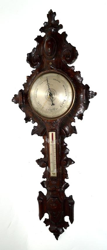 Oak Carved Barometer: Carved dark oak barometer, black forest style, possibly German. Missing interior back parts. 44" H x 17".