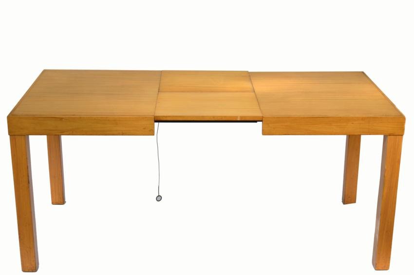 Herman Miller Table: Honey colored dining table with one leaf built in. 32 1/2" x 48" x 29" H.