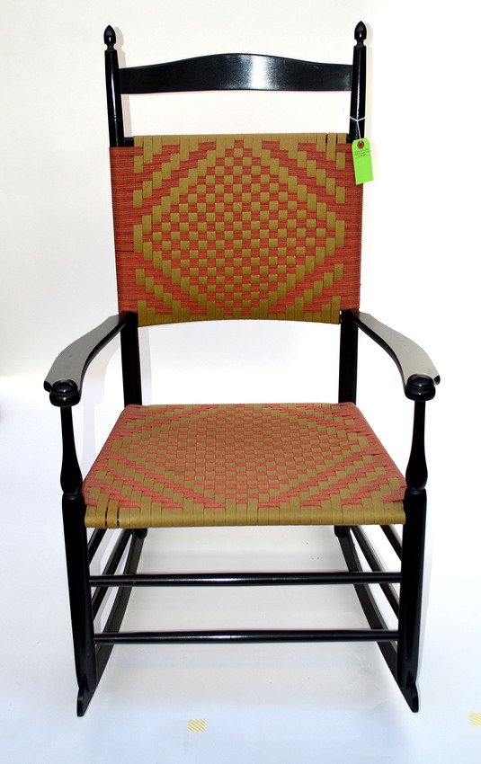 Modern Ebonized Rocking Chair: Bear woven textile back and seat. In good condition. 25" x 29 1/2" x 41" H.