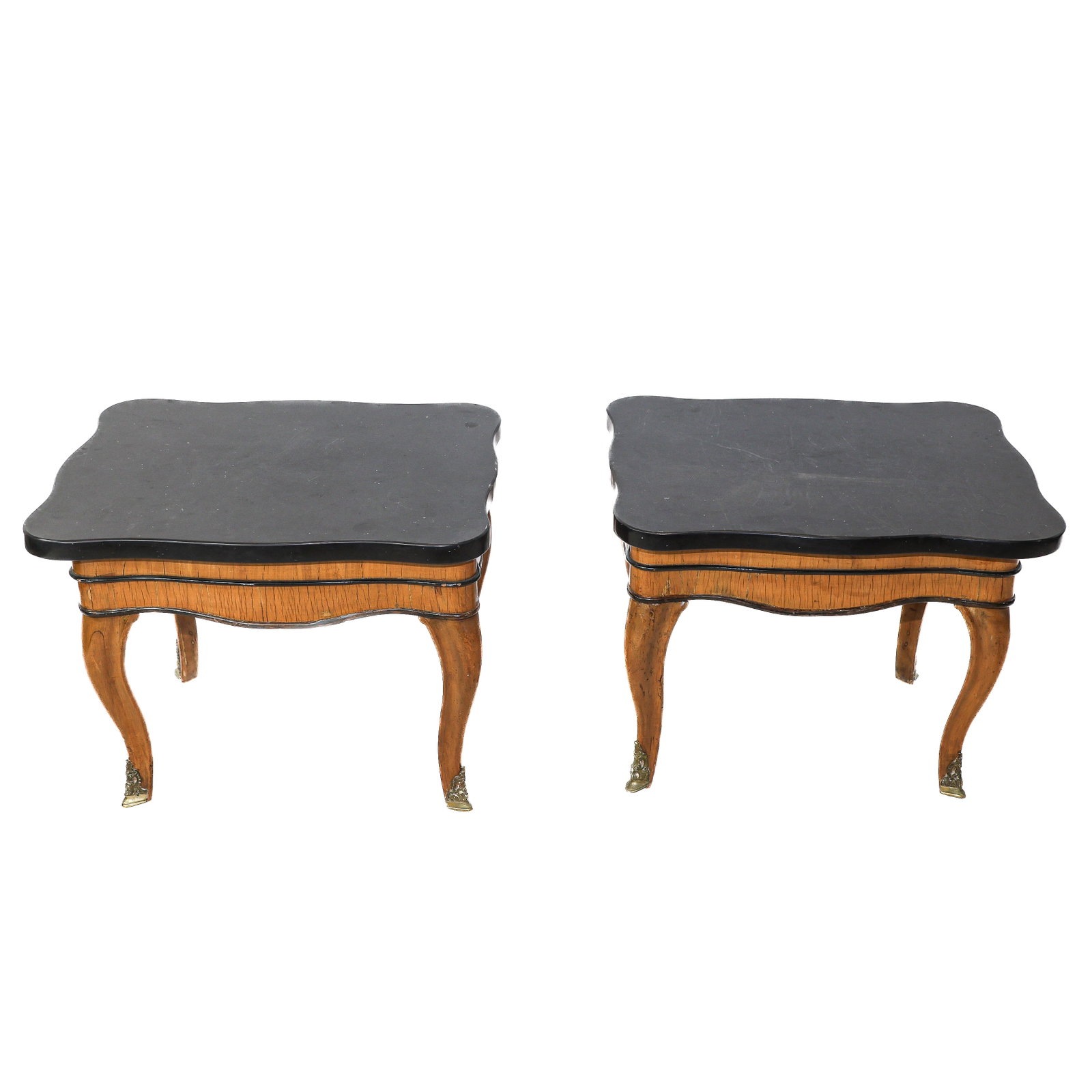 Pair of Venetian-Style Marble Top Tables: A pair of Venetian-style fruitwood shaped tables with bronze sabots and black marble tops. [Overall: 17 1/2" H x 18 1/2" W x 22 1/2" D].