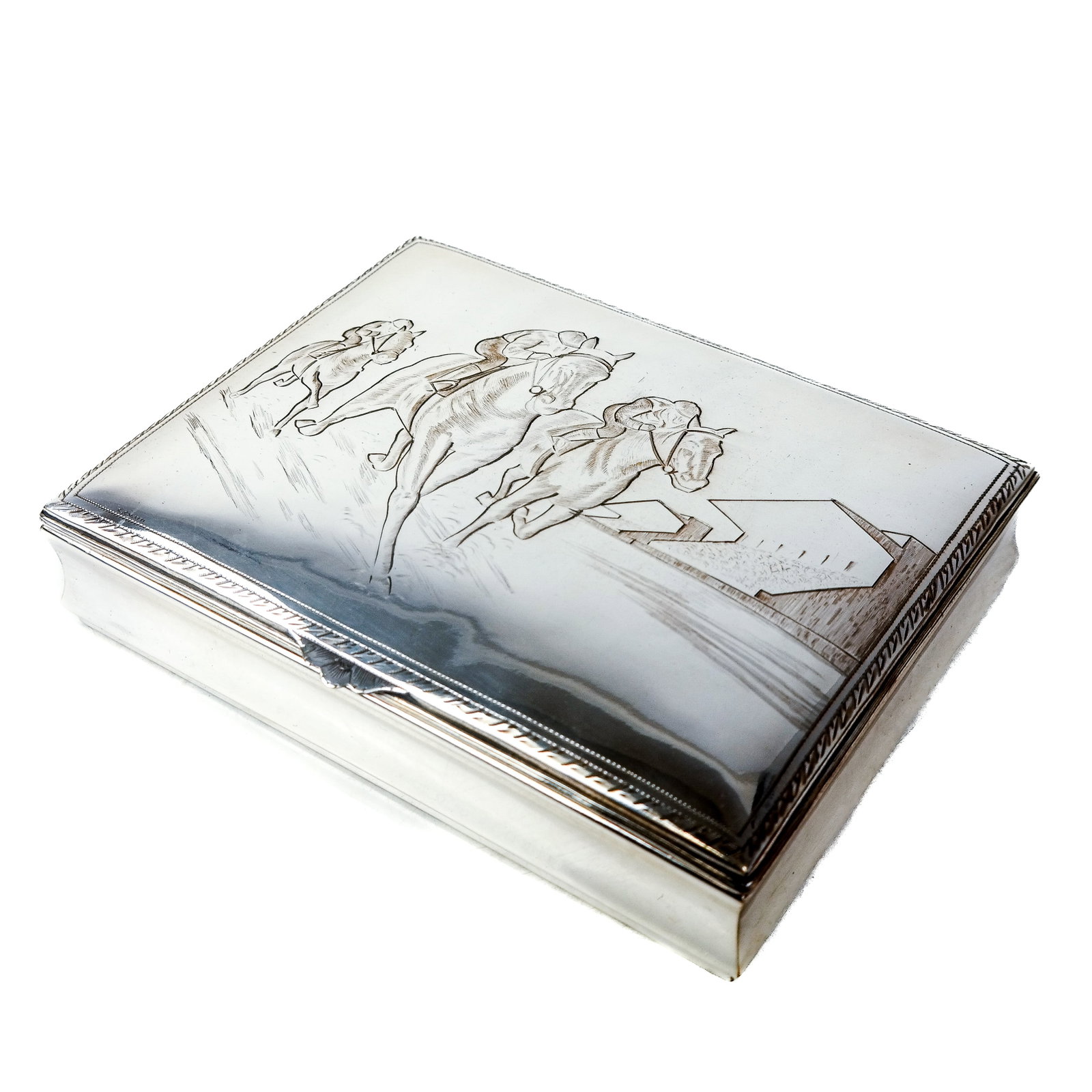 Sterling Silver Humidor with Horse Race Lid: A sterling silver humidor having engraved horse race lid. Bears makers mark on bottom. Signed "C. Caletti". [2 3/8" x 9 5/8" x 7 3/8"]. (Unweighable.). Provenance: From the Estate of Baroness Gabriele